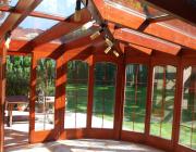 T22, Faszerkezetű télikert cikkelyes üvegtetővel, belső üvegosztókkal és íves szemöldökkel