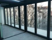 Télikert, üvegtetővel és eltolható nyílászárókkal