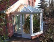 T78,Télikert műanyag nyílászárókkal, porfestett alumínium tető szerkezettel 